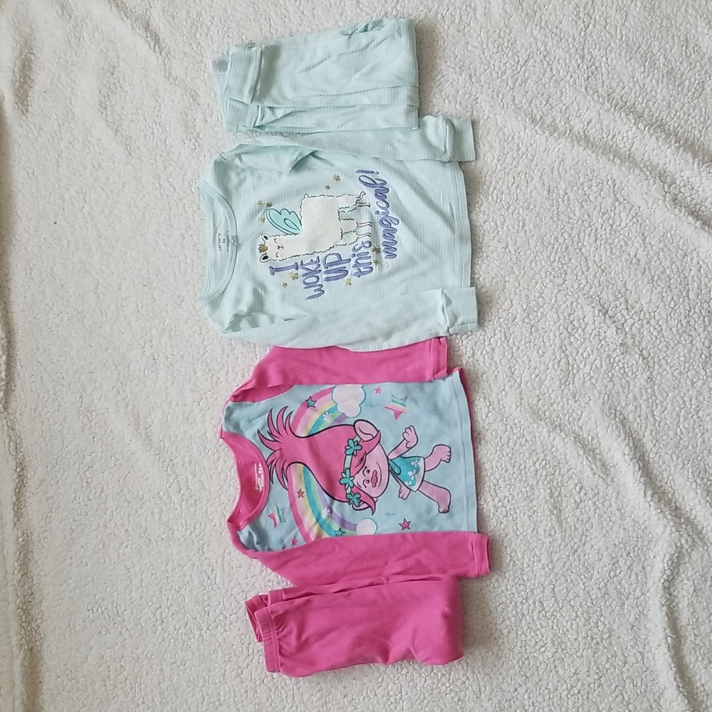 A Set of 2 Pajamas, Poppy from Trolls and a Llama